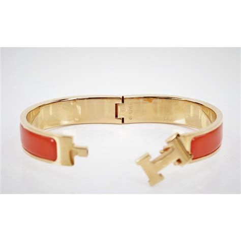 collier amulette hermes|hermes click clac bracelet.